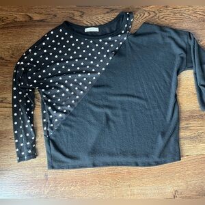 Sweater with open shoulder